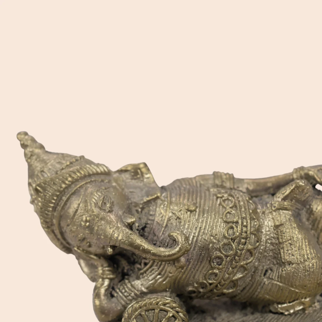Handcrafted Dokra Reclining Lord Ganesha – Traditional Brass Sculpture Thumbnail 5